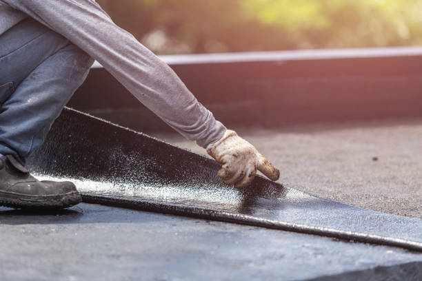 Professional Basement Waterproofing technician working in Salem, IN